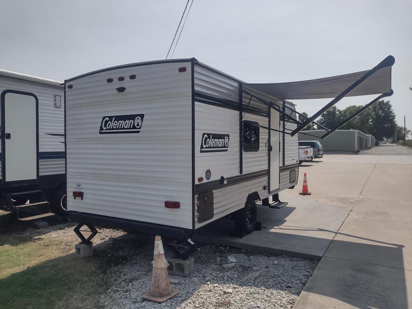 2025 White /TAN Keystone COLEMAN 17R 17R (4YDTCMG19SM) , located at 17760 Hwy 62, Morris, OK, 74445, 35.609104, -95.877060 - GRAB IT WHILE YOU CAN CHECK OUT THIS 2025 KEYSTONE COLEMAN 17R 21FT OVERALL WITH A 8FT POWER AWNING. IN THE FRONT IS A FULL SIZE BED WITH STORAGE UNDER THE BED, OVERHEAD SHELF, WARDROBE CLOSET, AND AC UNIT. IN THE LIVING AND KITCHEN AREA IS A 2 BURNER STOVE (NO OVEN), SINGLE SINK, OVERHEAD CABINETS, - Photo#2