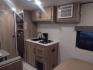 2025 White /TAN Keystone COLEMAN 17R 17R (4YDTCMG19SM) , located at 17760 Hwy 62, Morris, OK, 74445, 35.609104, -95.877060 - GRAB IT WHILE YOU CAN CHECK OUT THIS 2025 KEYSTONE COLEMAN 17R 21FT OVERALL WITH A 8FT POWER AWNING. IN THE FRONT IS A FULL SIZE BED WITH STORAGE UNDER THE BED, OVERHEAD SHELF, WARDROBE CLOSET, AND AC UNIT. IN THE LIVING AND KITCHEN AREA IS A 2 BURNER STOVE (NO OVEN), SINGLE SINK, OVERHEAD CABINETS, - Photo#8