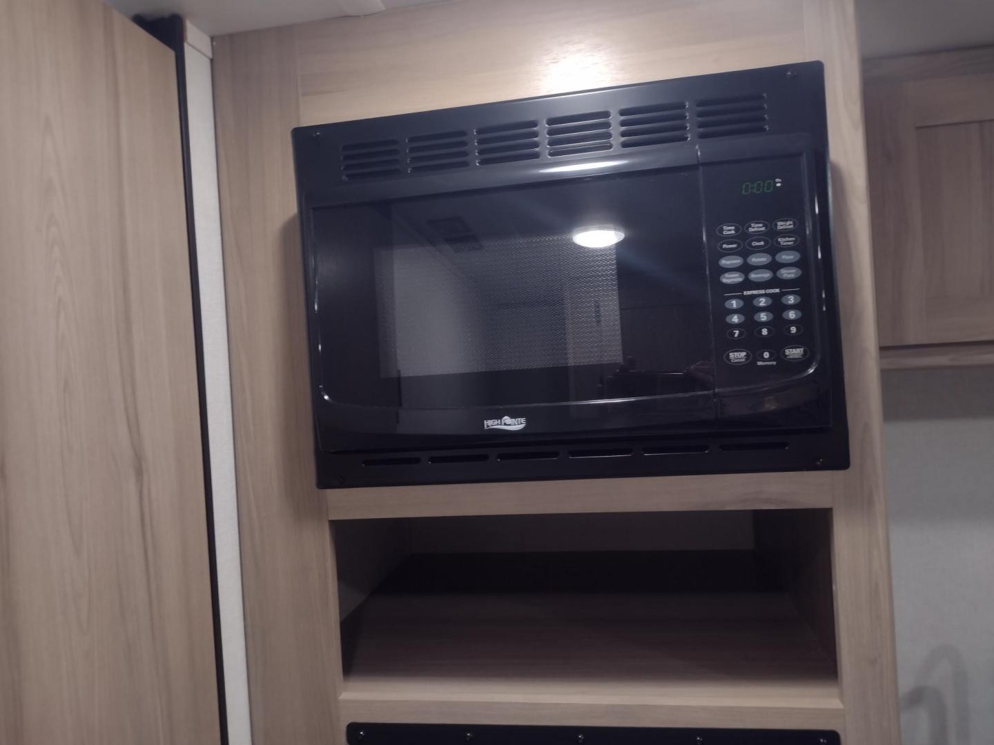 2025 White /TAN Keystone COLEMAN 17R 17R (4YDTCMG19SM) , located at 17760 Hwy 62, Morris, OK, 74445, 35.609104, -95.877060 - GRAB IT WHILE YOU CAN CHECK OUT THIS 2025 KEYSTONE COLEMAN 17R 21FT OVERALL WITH A 8FT POWER AWNING. IN THE FRONT IS A FULL SIZE BED WITH STORAGE UNDER THE BED, OVERHEAD SHELF, WARDROBE CLOSET, AND AC UNIT. IN THE LIVING AND KITCHEN AREA IS A 2 BURNER STOVE (NO OVEN), SINGLE SINK, OVERHEAD CABINETS, - Photo#20