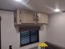 2025 White /TAN Keystone COLEMAN 17R 17R (4YDTCMG19SM) , located at 17760 Hwy 62, Morris, OK, 74445, 35.609104, -95.877060 - GRAB IT WHILE YOU CAN CHECK OUT THIS 2025 KEYSTONE COLEMAN 17R 21FT OVERALL WITH A 8FT POWER AWNING. IN THE FRONT IS A FULL SIZE BED WITH STORAGE UNDER THE BED, OVERHEAD SHELF, WARDROBE CLOSET, AND AC UNIT. IN THE LIVING AND KITCHEN AREA IS A 2 BURNER STOVE (NO OVEN), SINGLE SINK, OVERHEAD CABINETS, - Photo#21