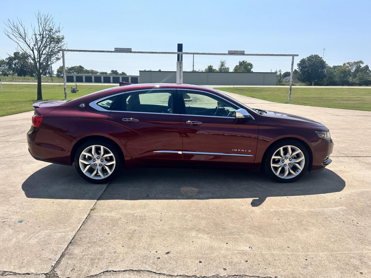 2017 RED /Gray Chevrolet Impala Premier (2G1145S36H9) with an 3.6L V6 DOHC 24V engine, 6A transmission, located at 17760 Hwy 62, Morris, OK, 74445, (918) 733-4887, 35.609104, -95.877060 - 2017 CHEVY IMPALA HAS THE 3.6L V6 ENGINE AND IS FWD. THIS CAR FEATURES PUSH START AND KEYLESS REMOTE ENTRY, POWER LOCKS, POWER WINDOWS, POWER SEATS, HEATED AND COOLED SEATS, POWER MIRRORS, AM/FM STEREO, NAVIGATION, LEATHER SEATS, BACK UP CAMERA, TRACTION CONTROL, CRUISE CONTROL, DUAL CLIMATE CONTROL - Photo#3