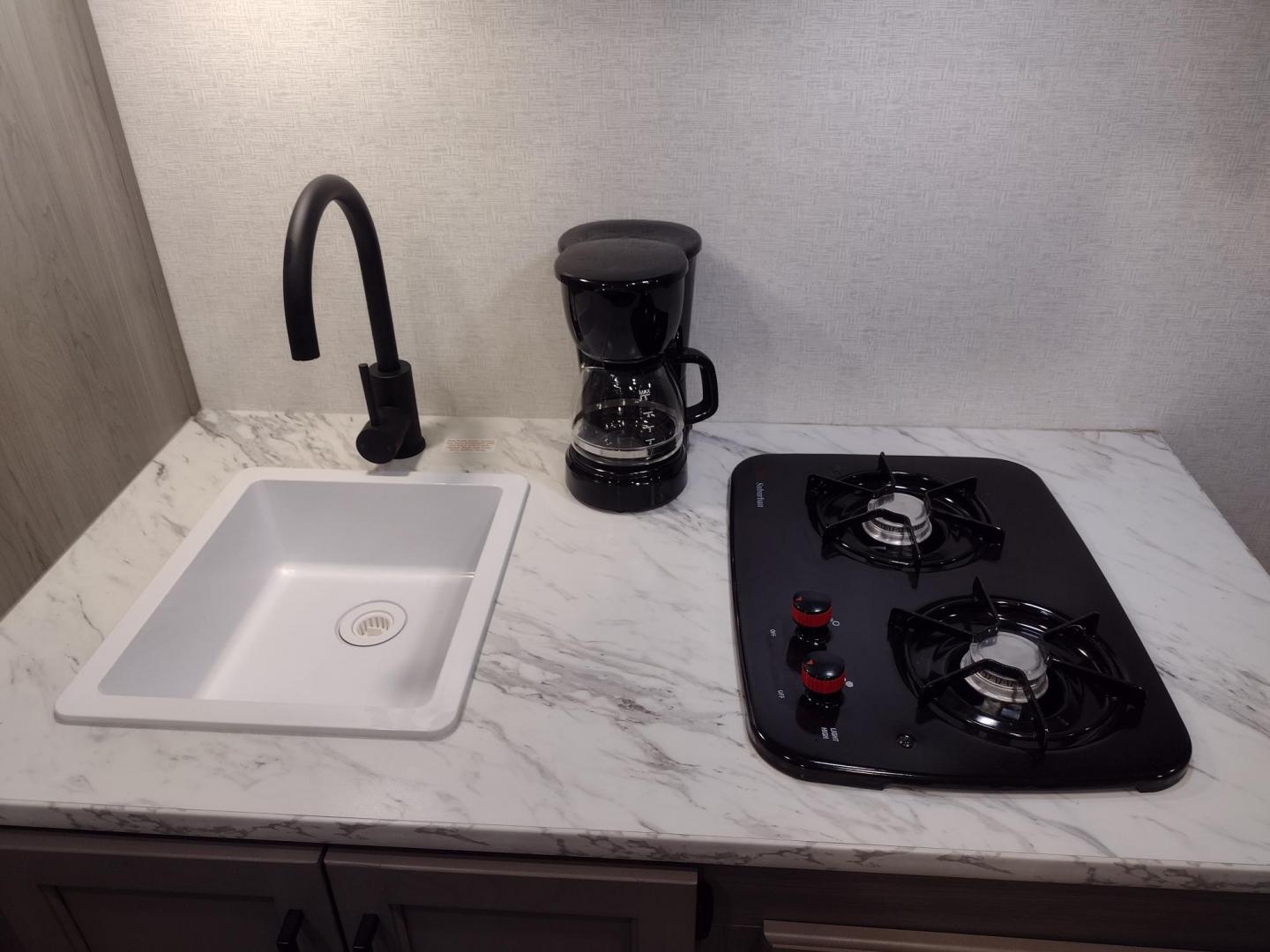 2024 WHITE/BLACK /TAN Keystone HIDEOUT 178RB 178RB (4YDTH1G14RW) , located at 17760 Hwy 62, Morris, OK, 74445, 35.609104, -95.877060 - GET IT WHILE YOU CAN! 2024 KEYSTONE HIDEOUT 178RB 20.5FT ****CLEAN TITLE**** OVERALL WITH 10FT POWER AWNING. IN THE FRONT IS THE QUEEN SIZE BED WITH STORAGE UNDER BED, OVERHEAD SHELF, AND TWO WARDROBE CLOSETS. IN THE LIVING AND KITCHEN AREA IS TWO BURNER STOVE (NO OVEN), SINGLE SINK, OVERHEAD CABINE - Photo#12