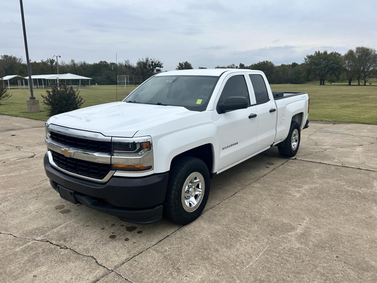 2017 White /Gray Chevrolet Silverado 1500 Work Truck Double Cab 4WD (1GCVKNEC2HZ) with an 5.3L V8 OHV 16V engine, 6A transmission, located at 17760 Hwy 62, Morris, OK, 74445, (918) 733-4887, 35.609104, -95.877060 - 2017 CHEVY SILVERADO 1500 4WD BI-FUEL SYSTEM THAT RUNS ON CNG OR GASOLINE WITH 5.3L V8 ENIGINE. IT FEATURES POWER LOCKS, POWER WINDOWS, MANUAL SEATS, LEATHER INTERIOR, CRUSIE CONTROL, TRACTION CONTROL, AM/FM RADIO, HANDS FREE CALLING, AND BACKUP CAMERA. ONLY 175,381 MILES WITH 265/70R17 TIRES. THIS - Photo#0