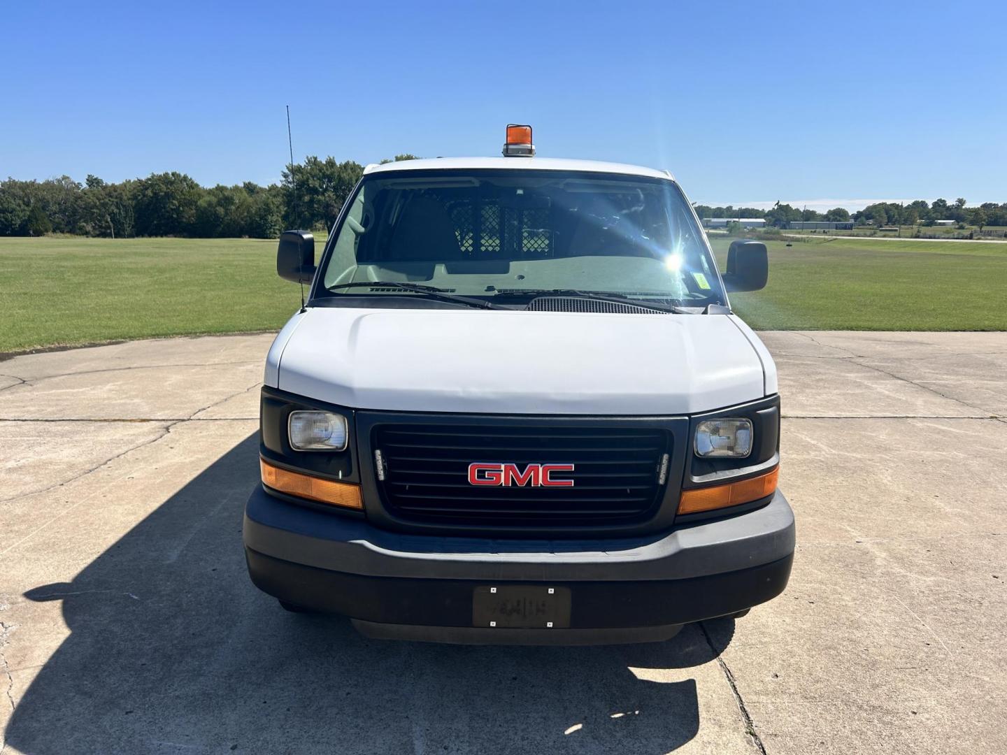 2012 White /Gray GMC Savana Cargo (1GTW7FFB5C1) with an 6.0L V8 OHV 16V CNG engine, 6-Speed Automatic transmission, located at 17760 Hwy 62, Morris, OK, 74445, (918) 733-4887, 35.609104, -95.877060 - 2012 GMC SAVANA CARGO VAN RWD WITH THE 6.0L V8 ENGINE DEDICATED CNG ONLY RUNS ON COMPRESSED NATURAL GAS. IT FEATURES POWER LOCKS, POWER WINDOWS, POWER MIRRORS, CLOTH INTERIOR, MANUAL SEATS, CRUISE CONTROL, TRACTION CONTROL, HAUL MODE, AM/FM RADIO, SPLIT SWING-OUT SIDE DOORS AND BACK DOORS, AND TIRE - Photo#1