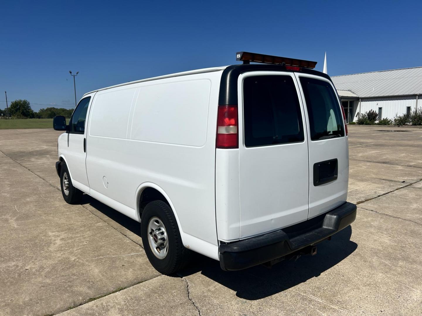 2012 White /Gray GMC Savana Cargo (1GTW7FFB5C1) with an 6.0L V8 OHV 16V CNG engine, 6-Speed Automatic transmission, located at 17760 Hwy 62, Morris, OK, 74445, (918) 733-4887, 35.609104, -95.877060 - 2012 GMC SAVANA CARGO VAN RWD WITH THE 6.0L V8 ENGINE DEDICATED CNG ONLY RUNS ON COMPRESSED NATURAL GAS. IT FEATURES POWER LOCKS, POWER WINDOWS, POWER MIRRORS, CLOTH INTERIOR, MANUAL SEATS, CRUISE CONTROL, TRACTION CONTROL, HAUL MODE, AM/FM RADIO, SPLIT SWING-OUT SIDE DOORS AND BACK DOORS, AND TIRE - Photo#6