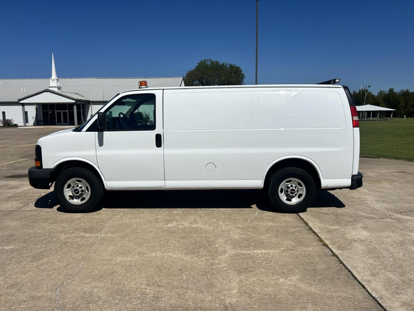 2012 White /Gray GMC Savana Cargo (1GTW7FFB5C1) with an 6.0L V8 OHV 16V CNG engine, 6-Speed Automatic transmission, located at 17760 Hwy 62, Morris, OK, 74445, (918) 733-4887, 35.609104, -95.877060 - 2012 GMC SAVANA CARGO VAN RWD WITH THE 6.0L V8 ENGINE DEDICATED CNG ONLY RUNS ON COMPRESSED NATURAL GAS. IT FEATURES POWER LOCKS, POWER WINDOWS, POWER MIRRORS, CLOTH INTERIOR, MANUAL SEATS, CRUISE CONTROL, TRACTION CONTROL, HAUL MODE, AM/FM RADIO, SPLIT SWING-OUT SIDE DOORS AND BACK DOORS, AND TIRE - Photo#7