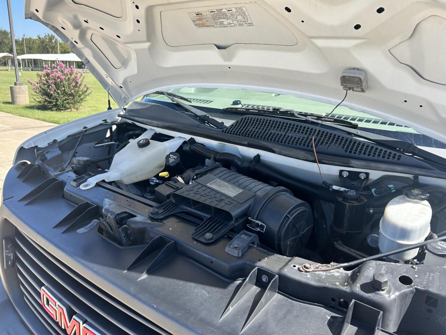 2012 White /Gray GMC Savana Cargo (1GTW7FFB5C1) with an 6.0L V8 OHV 16V CNG engine, 6-Speed Automatic transmission, located at 17760 Hwy 62, Morris, OK, 74445, (918) 733-4887, 35.609104, -95.877060 - 2012 GMC SAVANA CARGO VAN RWD WITH THE 6.0L V8 ENGINE DEDICATED CNG ONLY RUNS ON COMPRESSED NATURAL GAS. IT FEATURES POWER LOCKS, POWER WINDOWS, POWER MIRRORS, CLOTH INTERIOR, MANUAL SEATS, CRUISE CONTROL, TRACTION CONTROL, HAUL MODE, AM/FM RADIO, SPLIT SWING-OUT SIDE DOORS AND BACK DOORS, AND TIRE - Photo#19