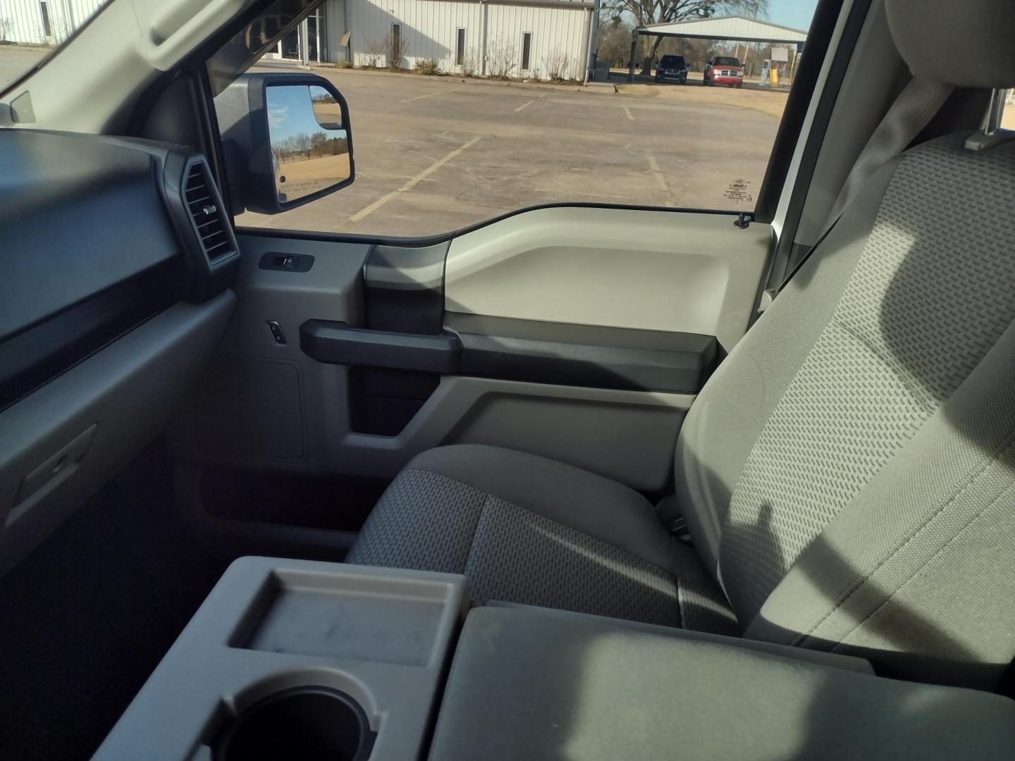 2016 White /Gray Ford F-150 XLT 4WD (1FTEW1EF1GK) with an 5.0L V8 engine, 6A transmission, located at 17760 Hwy 62, Morris, OK, 74445, (918) 733-4887, 35.609104, -95.877060 - 2016 FORD F150 XLT 4WD BI-FUEL SYSTEM RUNS ON CNG (COMPRESSED NATURAL GAS) OR GASOLINE WITH THE 5.0L V8 ENIGINE. FEATURES KEYLESS ENTRY, POWER LOCKS, POWER WINDOWS, POWER MIRRORS, CLOTH INTERIOR, MANUAL SEATS, AM/FM RADIO, CD PLAYER, HANDS FREE CALLING, BACKUP CAMERA, CRUISE CONTROL, TRACTION CONTRO - Photo#16