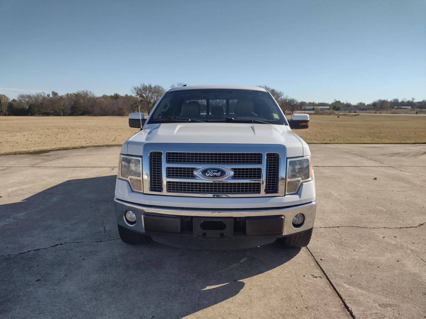 2012 White /TAN Ford F-150 LARIAT (1FTFW1CFXCF) with an 5.0L V8 engine, 6-Speed Automatic transmission, located at 17760 Hwy 62, Morris, OK, 74445, (918) 733-4887, 35.609104, -95.877060 - 2012 FORD F150 LARIAT 2WD BI-FUEL SYSTEM RUNS ON CNG (COMPRESSED NATURAL GAS) OR GASOLINE WITH 5.0L V8 ENIGNE. IT FEATURES KEYLESS ENTRY, POWER LOCKS, POWER WINDOWS, POWER MIRRORS, POWER SEATS, LEATHER INTERIOR, HEATED AND COOLED SEATS, AM/FM RADIO, NAVIGATION, CD PLAYER, HANDS FREE CALLING, DUAL CL - Photo#1