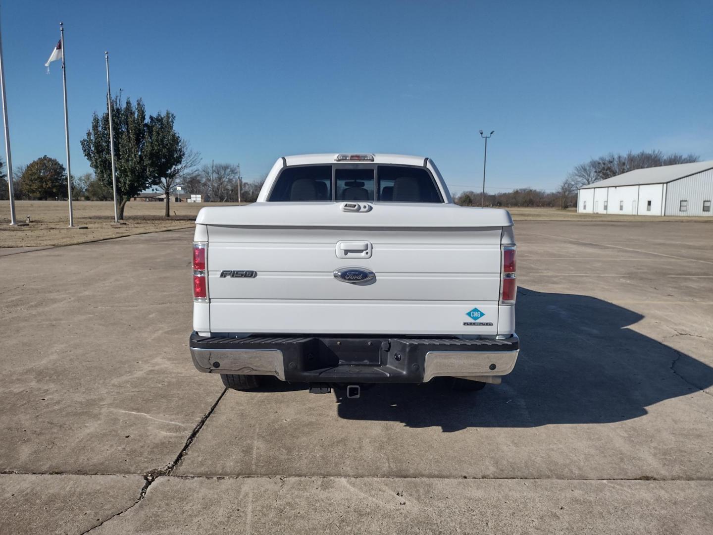 2012 White /TAN Ford F-150 LARIAT (1FTFW1CFXCF) with an 5.0L V8 engine, 6-Speed Automatic transmission, located at 17760 Hwy 62, Morris, OK, 74445, (918) 733-4887, 35.609104, -95.877060 - 2012 FORD F150 LARIAT 2WD BI-FUEL SYSTEM RUNS ON CNG (COMPRESSED NATURAL GAS) OR GASOLINE WITH 5.0L V8 ENIGNE. IT FEATURES KEYLESS ENTRY, POWER LOCKS, POWER WINDOWS, POWER MIRRORS, POWER SEATS, LEATHER INTERIOR, HEATED AND COOLED SEATS, AM/FM RADIO, NAVIGATION, CD PLAYER, HANDS FREE CALLING, DUAL CL - Photo#5
