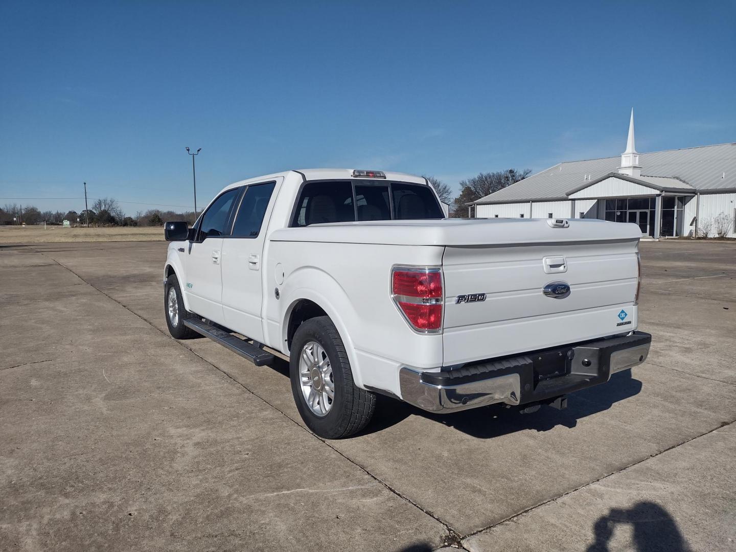 2012 White /TAN Ford F-150 LARIAT (1FTFW1CFXCF) with an 5.0L V8 engine, 6-Speed Automatic transmission, located at 17760 Hwy 62, Morris, OK, 74445, (918) 733-4887, 35.609104, -95.877060 - 2012 FORD F150 LARIAT 2WD BI-FUEL SYSTEM RUNS ON CNG (COMPRESSED NATURAL GAS) OR GASOLINE WITH 5.0L V8 ENIGNE. IT FEATURES KEYLESS ENTRY, POWER LOCKS, POWER WINDOWS, POWER MIRRORS, POWER SEATS, LEATHER INTERIOR, HEATED AND COOLED SEATS, AM/FM RADIO, NAVIGATION, CD PLAYER, HANDS FREE CALLING, DUAL CL - Photo#6