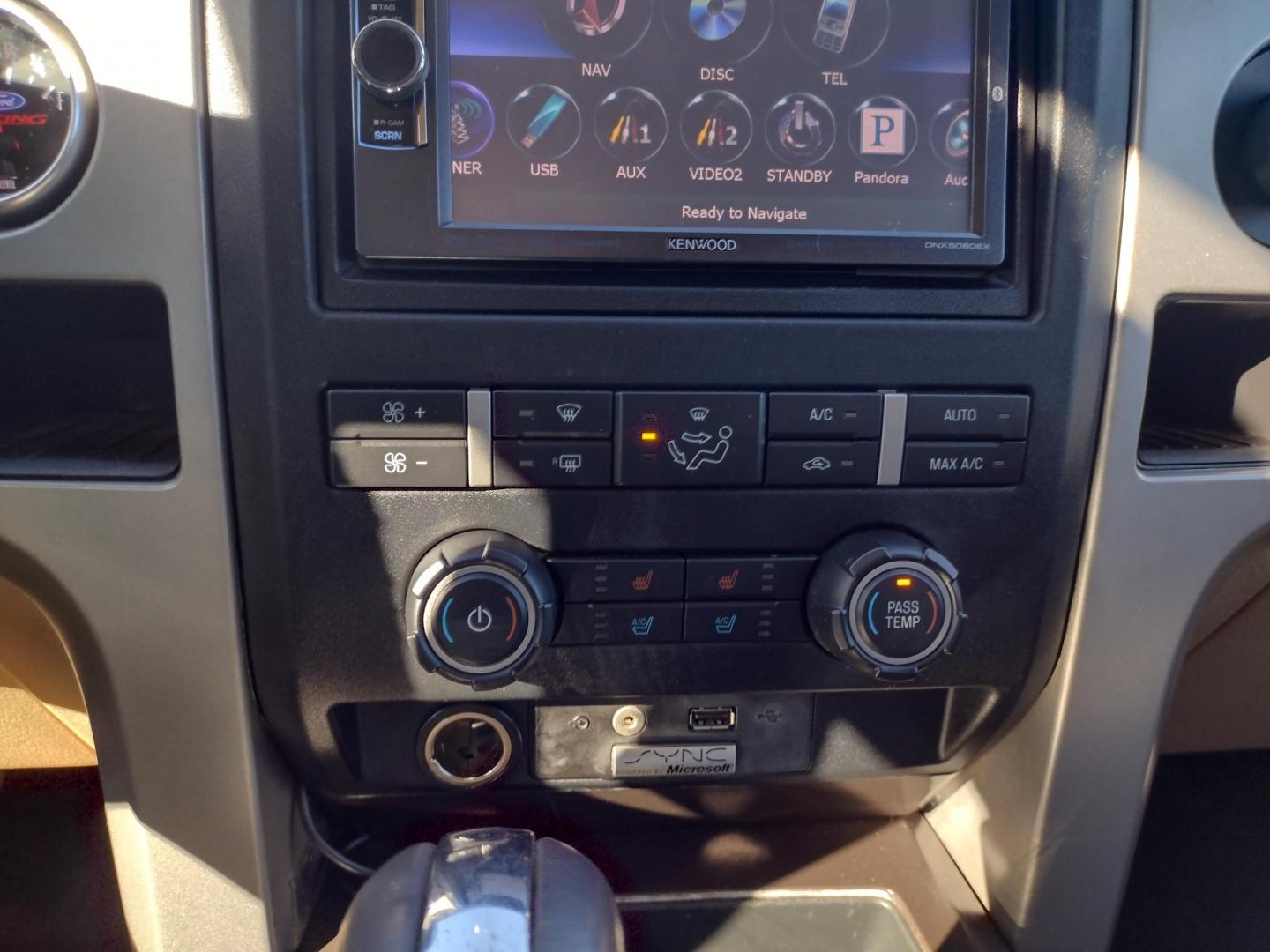 2012 White /TAN Ford F-150 LARIAT (1FTFW1CFXCF) with an 5.0L V8 engine, 6-Speed Automatic transmission, located at 17760 Hwy 62, Morris, OK, 74445, (918) 733-4887, 35.609104, -95.877060 - 2012 FORD F150 LARIAT 2WD BI-FUEL SYSTEM RUNS ON CNG (COMPRESSED NATURAL GAS) OR GASOLINE WITH 5.0L V8 ENIGNE. IT FEATURES KEYLESS ENTRY, POWER LOCKS, POWER WINDOWS, POWER MIRRORS, POWER SEATS, LEATHER INTERIOR, HEATED AND COOLED SEATS, AM/FM RADIO, NAVIGATION, CD PLAYER, HANDS FREE CALLING, DUAL CL - Photo#15