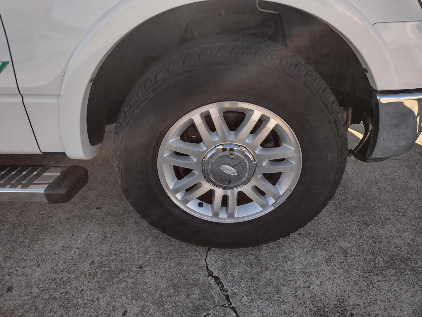 2012 White /TAN Ford F-150 LARIAT (1FTFW1CFXCF) with an 5.0L V8 engine, 6-Speed Automatic transmission, located at 17760 Hwy 62, Morris, OK, 74445, (918) 733-4887, 35.609104, -95.877060 - 2012 FORD F150 LARIAT 2WD BI-FUEL SYSTEM RUNS ON CNG (COMPRESSED NATURAL GAS) OR GASOLINE WITH 5.0L V8 ENIGNE. IT FEATURES KEYLESS ENTRY, POWER LOCKS, POWER WINDOWS, POWER MIRRORS, POWER SEATS, LEATHER INTERIOR, HEATED AND COOLED SEATS, AM/FM RADIO, NAVIGATION, CD PLAYER, HANDS FREE CALLING, DUAL CL - Photo#34