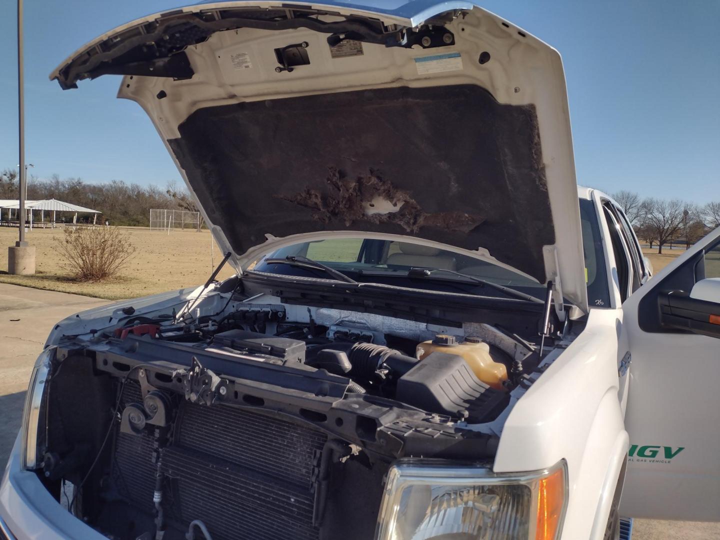 2012 White /TAN Ford F-150 LARIAT (1FTFW1CFXCF) with an 5.0L V8 engine, 6-Speed Automatic transmission, located at 17760 Hwy 62, Morris, OK, 74445, (918) 733-4887, 35.609104, -95.877060 - 2012 FORD F150 LARIAT 2WD BI-FUEL SYSTEM RUNS ON CNG (COMPRESSED NATURAL GAS) OR GASOLINE WITH 5.0L V8 ENIGNE. IT FEATURES KEYLESS ENTRY, POWER LOCKS, POWER WINDOWS, POWER MIRRORS, POWER SEATS, LEATHER INTERIOR, HEATED AND COOLED SEATS, AM/FM RADIO, NAVIGATION, CD PLAYER, HANDS FREE CALLING, DUAL CL - Photo#31