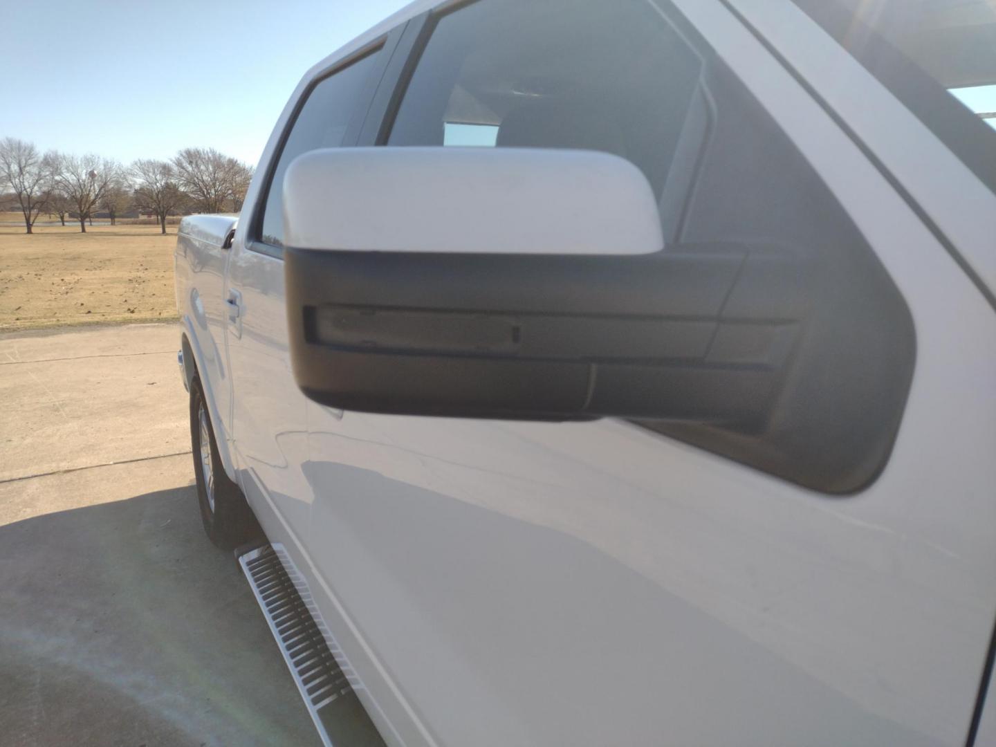 2012 White /TAN Ford F-150 LARIAT (1FTFW1CFXCF) with an 5.0L V8 engine, 6-Speed Automatic transmission, located at 17760 Hwy 62, Morris, OK, 74445, (918) 733-4887, 35.609104, -95.877060 - 2012 FORD F150 LARIAT 2WD BI-FUEL SYSTEM RUNS ON CNG (COMPRESSED NATURAL GAS) OR GASOLINE WITH 5.0L V8 ENIGNE. IT FEATURES KEYLESS ENTRY, POWER LOCKS, POWER WINDOWS, POWER MIRRORS, POWER SEATS, LEATHER INTERIOR, HEATED AND COOLED SEATS, AM/FM RADIO, NAVIGATION, CD PLAYER, HANDS FREE CALLING, DUAL CL - Photo#40