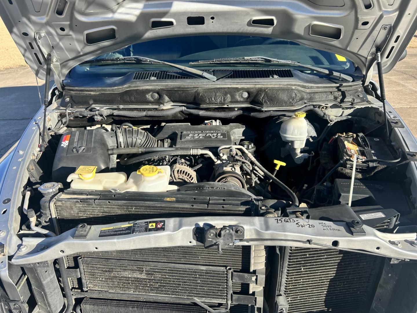 2005 Silver /BLACK Dodge Ram 1500 SLT (1D7HU18D05J) with an 5.7L V8 OHV 16V engine, 5-Speed Automatic Overdrive transmission, located at 17760 Hwy 62, Morris, OK, 74445, (918) 733-4887, 35.609104, -95.877060 - 2005 DODGE RAM DAYTONA 1500 4WD HAS THE 5.7L V8 HEMI ENGINE. IT FEATURES POWER WINDOWS, POWER LOCK, POWER MIRRORS, POWER SEATS, CLOTH SEATS, AM/FM RADIO, SATELLITE RADIO, BLUETOOTH, APPLE CAR PLAY, BACK UP CAMERA, AND BED LINER. WILD PEAK 275/60R20 TIRES AND ONLY 142,038 MILES. ***HAS LIGHT HAIL D - Photo#16