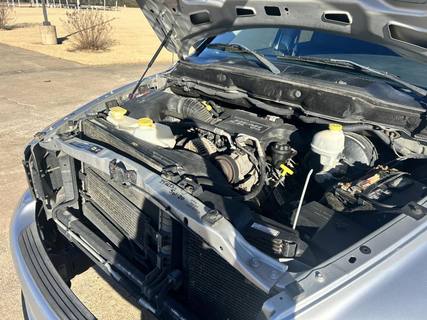 2005 Silver /BLACK Dodge Ram 1500 SLT (1D7HU18D05J) with an 5.7L V8 OHV 16V engine, 5-Speed Automatic Overdrive transmission, located at 17760 Hwy 62, Morris, OK, 74445, (918) 733-4887, 35.609104, -95.877060 - 2005 DODGE RAM DAYTONA 1500 4WD HAS THE 5.7L V8 HEMI ENGINE. IT FEATURES POWER WINDOWS, POWER LOCK, POWER MIRRORS, POWER SEATS, CLOTH SEATS, AM/FM RADIO, SATELLITE RADIO, BLUETOOTH, APPLE CAR PLAY, BACK UP CAMERA, AND BED LINER. WILD PEAK 275/60R20 TIRES AND ONLY 142,038 MILES. ***HAS LIGHT HAIL D - Photo#17