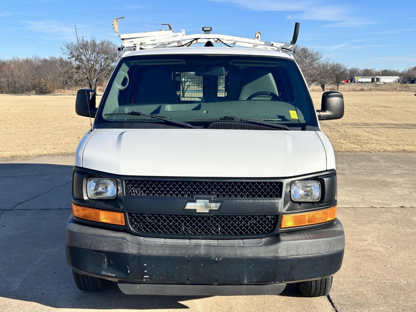 2013 White /Gray Chevrolet Express 2500 Cargo (1GCWGFCB5D1) with an 6.0L V8 OHV 16V FFV engine, 6-Speed Automatic transmission, located at 17760 Hwy 62, Morris, OK, 74445, (918) 733-4887, 35.609104, -95.877060 - 2013 CHEVROLET EXPRESS DEDICATED CNG ONLY RUNS ON COMPRESSED NATURAL GAS RWD 6.0L V8 ENGINE. FEATURING POWER LOCKS, MANUAL WINDOWS, MANUAL MIRRORS, MANUAL SEATS, AM/FM STEREO, LEATHER SEATS, BACKUP CAMERA, TRACTION CONTROL, LOCKING METAL CONSOLE, STEEL SHELVES, SPLIT SWING-OUT RIGHT DOORS, AND TOW P - Photo#1