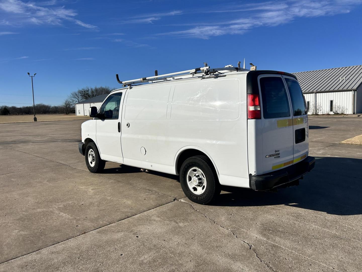 2013 White /Gray Chevrolet Express 2500 Cargo (1GCWGFCB5D1) with an 6.0L V8 OHV 16V FFV engine, 6-Speed Automatic transmission, located at 17760 Hwy 62, Morris, OK, 74445, (918) 733-4887, 35.609104, -95.877060 - 2013 CHEVROLET EXPRESS DEDICATED CNG ONLY RUNS ON COMPRESSED NATURAL GAS RWD 6.0L V8 ENGINE. FEATURING POWER LOCKS, MANUAL WINDOWS, MANUAL MIRRORS, MANUAL SEATS, AM/FM STEREO, LEATHER SEATS, BACKUP CAMERA, TRACTION CONTROL, LOCKING METAL CONSOLE, STEEL SHELVES, SPLIT SWING-OUT RIGHT DOORS, AND TOW P - Photo#6