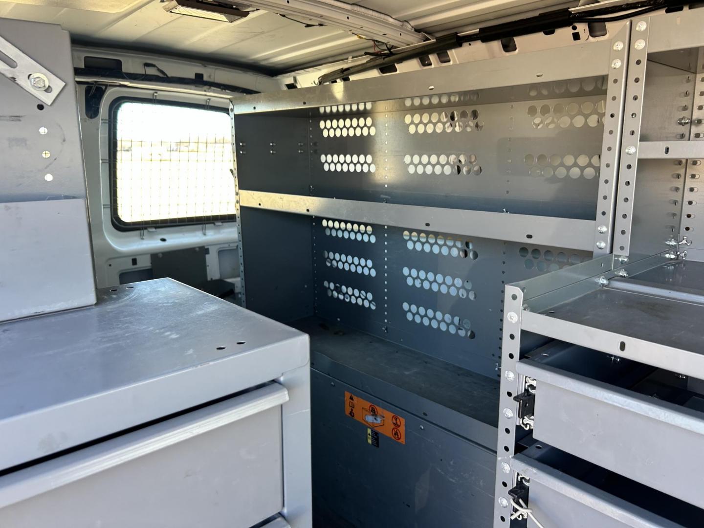 2013 White /Gray Chevrolet Express 2500 Cargo (1GCWGFCB5D1) with an 6.0L V8 OHV 16V FFV engine, 6-Speed Automatic transmission, located at 17760 Hwy 62, Morris, OK, 74445, (918) 733-4887, 35.609104, -95.877060 - 2013 CHEVROLET EXPRESS DEDICATED CNG ONLY RUNS ON COMPRESSED NATURAL GAS RWD 6.0L V8 ENGINE. FEATURING POWER LOCKS, MANUAL WINDOWS, MANUAL MIRRORS, MANUAL SEATS, AM/FM STEREO, LEATHER SEATS, BACKUP CAMERA, TRACTION CONTROL, LOCKING METAL CONSOLE, STEEL SHELVES, SPLIT SWING-OUT RIGHT DOORS, AND TOW P - Photo#18