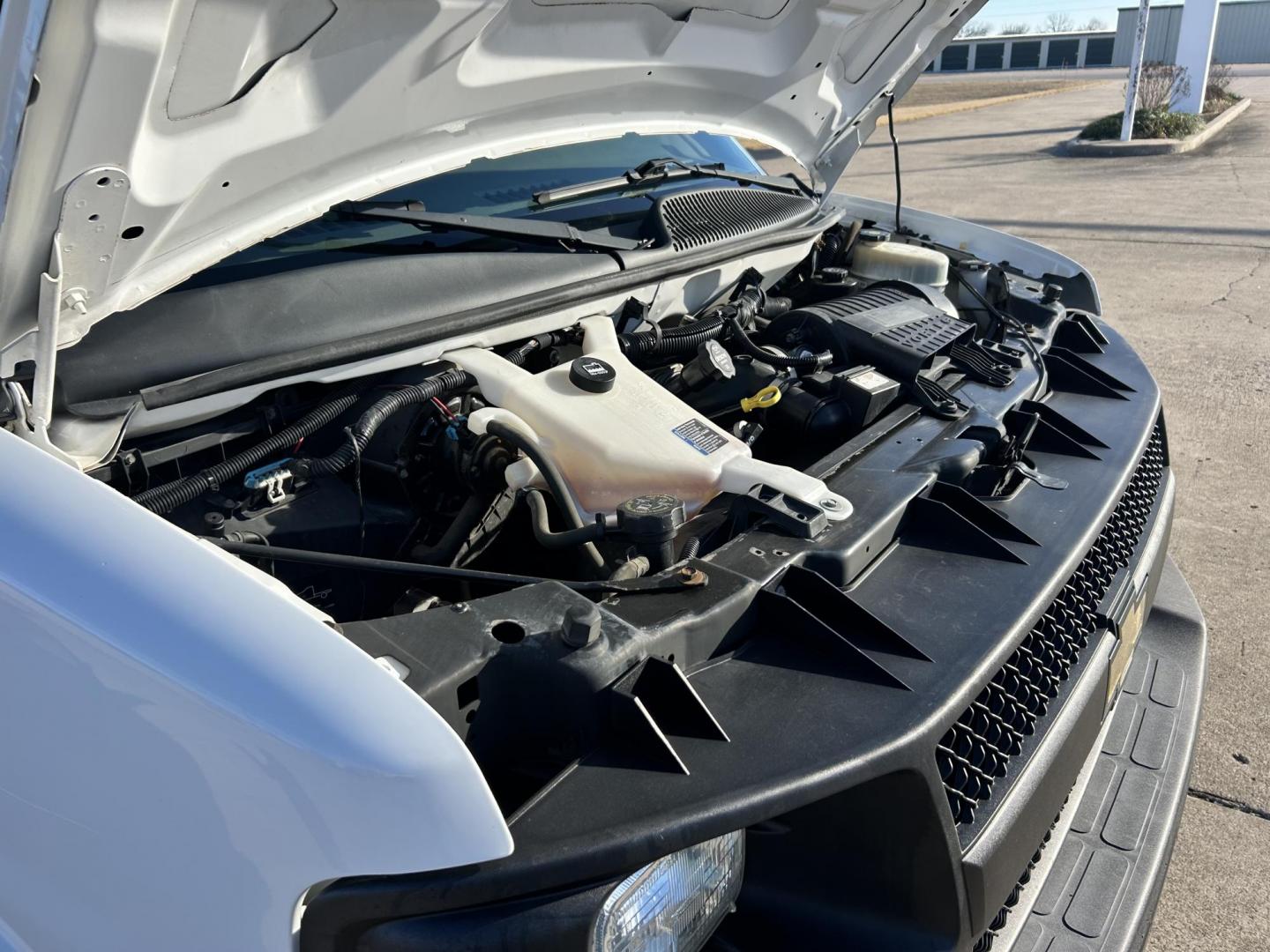 2013 White /Gray Chevrolet Express 2500 Cargo (1GCWGFCB5D1) with an 6.0L V8 OHV 16V FFV engine, 6-Speed Automatic transmission, located at 17760 Hwy 62, Morris, OK, 74445, (918) 733-4887, 35.609104, -95.877060 - 2013 CHEVROLET EXPRESS DEDICATED CNG ONLY RUNS ON COMPRESSED NATURAL GAS RWD 6.0L V8 ENGINE. FEATURING POWER LOCKS, MANUAL WINDOWS, MANUAL MIRRORS, MANUAL SEATS, AM/FM STEREO, LEATHER SEATS, BACKUP CAMERA, TRACTION CONTROL, LOCKING METAL CONSOLE, STEEL SHELVES, SPLIT SWING-OUT RIGHT DOORS, AND TOW P - Photo#23