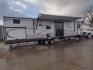 2014 Silver /Gray Forest River Catalina 39BHTS (5ZT2CA4B2ET) , located at 17760 Hwy 62, Morris, OK, 74445, 35.609104, -95.877060 - GET IT WHILE YOU CAN!!! 2014 FOREST RIVER CATALINA COACHMEN 39BHTS 41FT OVERALL WITH 21FT POWER AWNING.***REBUILT TITLE*** IN THE MASTER BEDROOM IS A QUEEN SIZE BED WITH STORAGE UNDER THE BED, OVERHEAD CABINETS, WARDROBE CABINETS, WARDROBE CLOSET, AND CEILING FAN. IN THE LIVING/KITCHEN AREA IS AN EN - Photo#1