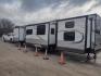 2014 Silver /Gray Forest River Catalina 39BHTS (5ZT2CA4B2ET) , located at 17760 Hwy 62, Morris, OK, 74445, 35.609104, -95.877060 - GET IT WHILE YOU CAN!!! 2014 FOREST RIVER CATALINA COACHMEN 39BHTS 41FT OVERALL WITH 21FT POWER AWNING.***REBUILT TITLE*** IN THE MASTER BEDROOM IS A QUEEN SIZE BED WITH STORAGE UNDER THE BED, OVERHEAD CABINETS, WARDROBE CABINETS, WARDROBE CLOSET, AND CEILING FAN. IN THE LIVING/KITCHEN AREA IS AN EN - Photo#5