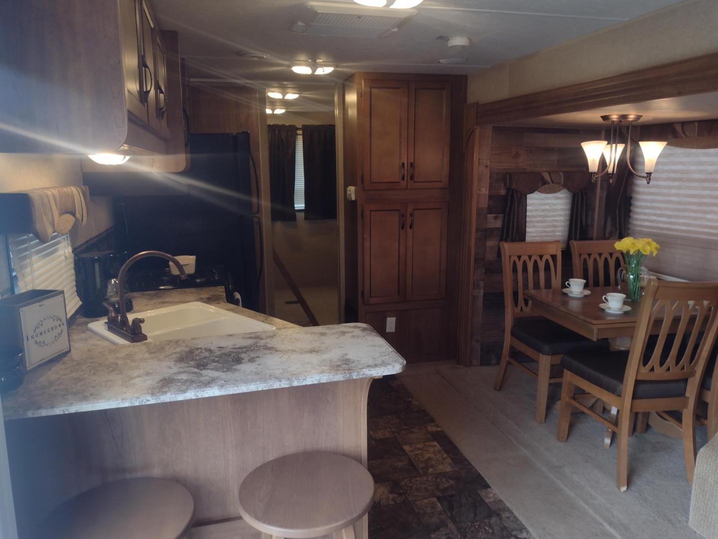 2014 Silver /Gray Forest River Catalina 39BHTS (5ZT2CA4B2ET) , located at 17760 Hwy 62, Morris, OK, 74445, 35.609104, -95.877060 - GET IT WHILE YOU CAN!!! 2014 FOREST RIVER CATALINA COACHMEN 39BHTS 41FT OVERALL WITH 21FT POWER AWNING.***REBUILT TITLE*** IN THE MASTER BEDROOM IS A QUEEN SIZE BED WITH STORAGE UNDER THE BED, OVERHEAD CABINETS, WARDROBE CABINETS, WARDROBE CLOSET, AND CEILING FAN. IN THE LIVING/KITCHEN AREA IS AN EN - Photo#14