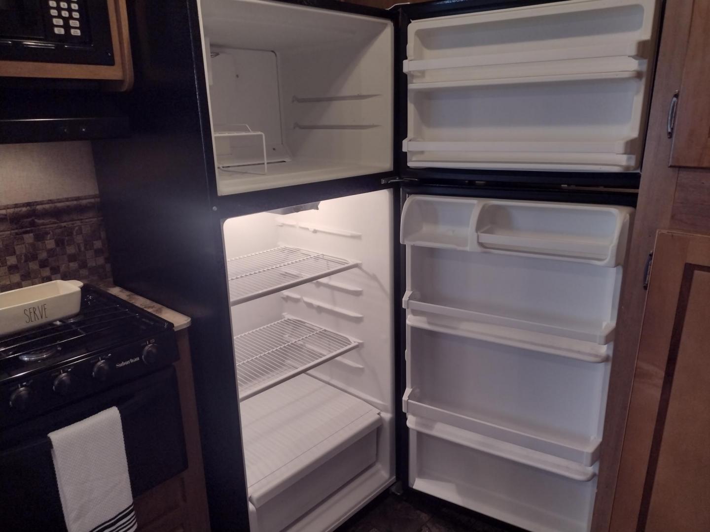 2014 Silver /Gray Forest River Catalina 39BHTS (5ZT2CA4B2ET) , located at 17760 Hwy 62, Morris, OK, 74445, 35.609104, -95.877060 - GET IT WHILE YOU CAN!!! 2014 FOREST RIVER CATALINA COACHMEN 39BHTS 41FT OVERALL WITH 21FT POWER AWNING.***REBUILT TITLE*** IN THE MASTER BEDROOM IS A QUEEN SIZE BED WITH STORAGE UNDER THE BED, OVERHEAD CABINETS, WARDROBE CABINETS, WARDROBE CLOSET, AND CEILING FAN. IN THE LIVING/KITCHEN AREA IS AN EN - Photo#28