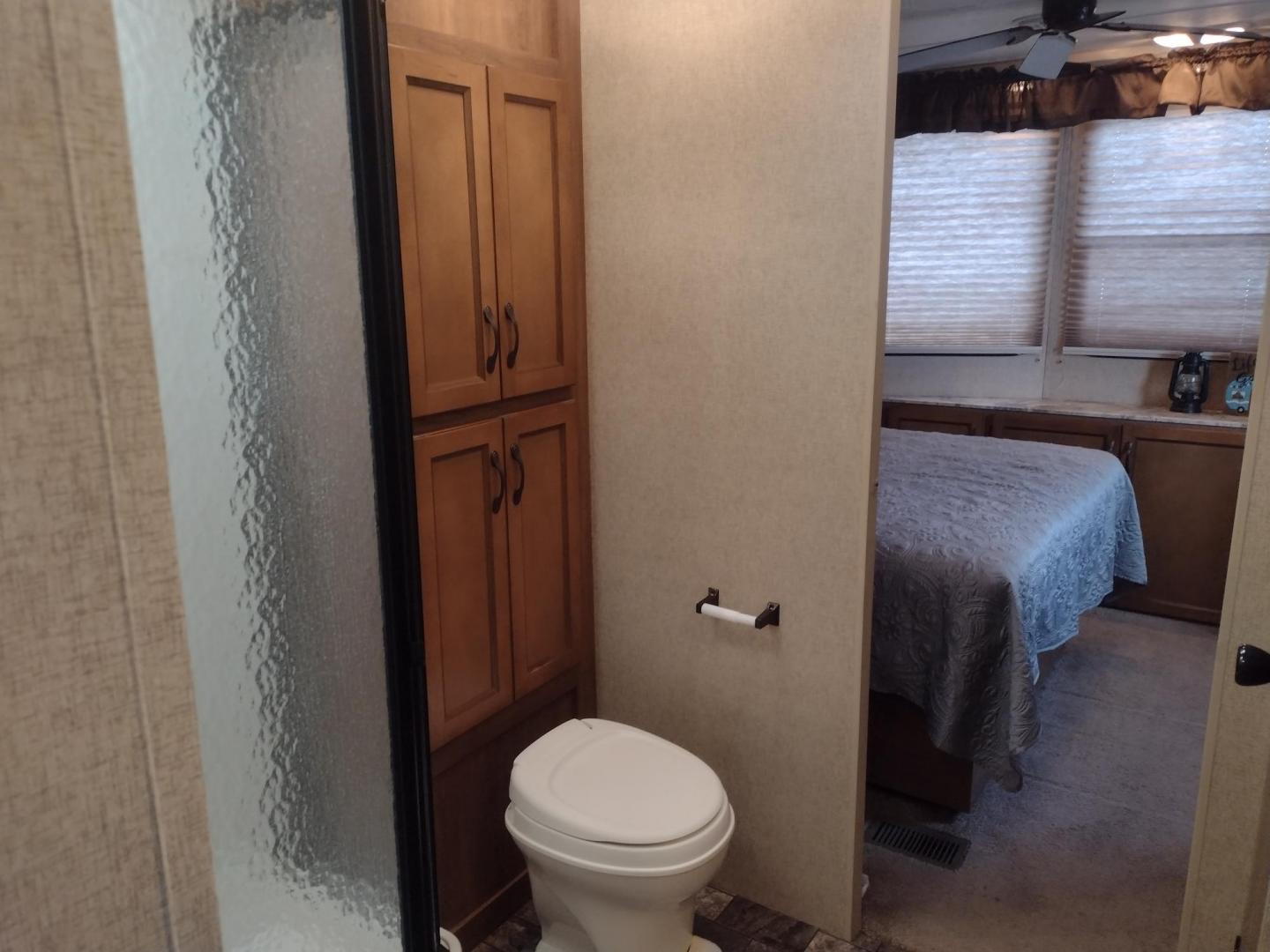 2014 Silver /Gray Forest River Catalina 39BHTS (5ZT2CA4B2ET) , located at 17760 Hwy 62, Morris, OK, 74445, 35.609104, -95.877060 - GET IT WHILE YOU CAN!!! 2014 FOREST RIVER CATALINA COACHMEN 39BHTS 41FT OVERALL WITH 21FT POWER AWNING.***REBUILT TITLE*** IN THE MASTER BEDROOM IS A QUEEN SIZE BED WITH STORAGE UNDER THE BED, OVERHEAD CABINETS, WARDROBE CABINETS, WARDROBE CLOSET, AND CEILING FAN. IN THE LIVING/KITCHEN AREA IS AN EN - Photo#40