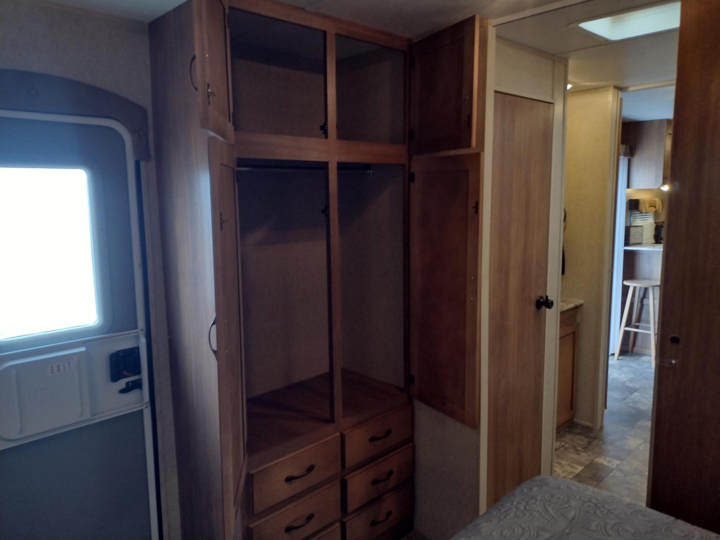 2014 Silver /Gray Forest River Catalina 39BHTS (5ZT2CA4B2ET) , located at 17760 Hwy 62, Morris, OK, 74445, 35.609104, -95.877060 - GET IT WHILE YOU CAN!!! 2014 FOREST RIVER CATALINA COACHMEN 39BHTS 41FT OVERALL WITH 21FT POWER AWNING.***REBUILT TITLE*** IN THE MASTER BEDROOM IS A QUEEN SIZE BED WITH STORAGE UNDER THE BED, OVERHEAD CABINETS, WARDROBE CABINETS, WARDROBE CLOSET, AND CEILING FAN. IN THE LIVING/KITCHEN AREA IS AN EN - Photo#50