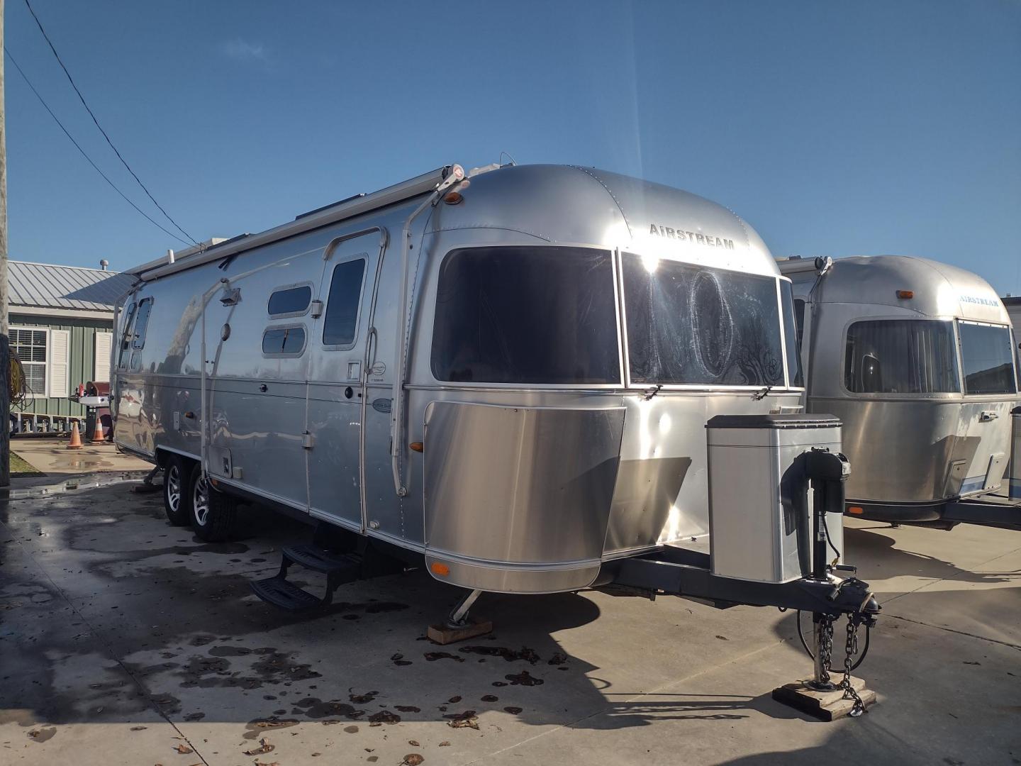 2014 Silver /TAN Airstream FLYING CLOUD 30 30 (1STJ9YP22EJ) , located at 17760 Hwy 62, Morris, OK, 74445, 35.609104, -95.877060 - HAVE YOU EVER WANTED TO BECOME PART OF THE AIRSTREAM FAMILY? WELL HERE IS YOUR CHANCE, CHECK OUT THIS 2014 AIRSTREAM FLYING CLOUD 30 31FT OVERALL WITH A 21FT MANUAL AWNING. ***REBUILT TITLE DUE TO HAIL DAMAGE*** IN THE LIVING AND KITCHEN AREA IS A LEATHER SOFA THAT FOLDS DOWN FOR ADDITIONAL SLEEPING - Photo#0