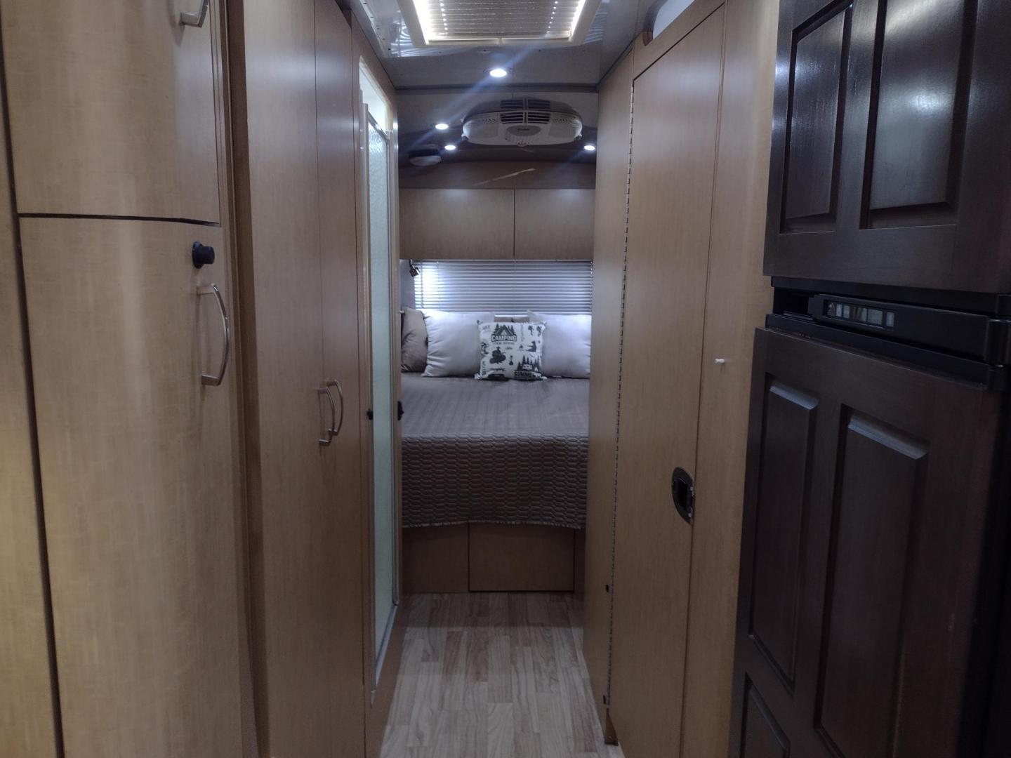 2014 Silver /TAN Airstream FLYING CLOUD 30 30 (1STJ9YP22EJ) , located at 17760 Hwy 62, Morris, OK, 74445, 35.609104, -95.877060 - HAVE YOU EVER WANTED TO BECOME PART OF THE AIRSTREAM FAMILY? WELL HERE IS YOUR CHANCE, CHECK OUT THIS 2014 AIRSTREAM FLYING CLOUD 30 31FT OVERALL WITH A 21FT MANUAL AWNING. ***REBUILT TITLE DUE TO HAIL DAMAGE*** IN THE LIVING AND KITCHEN AREA IS A LEATHER SOFA THAT FOLDS DOWN FOR ADDITIONAL SLEEPING - Photo#15