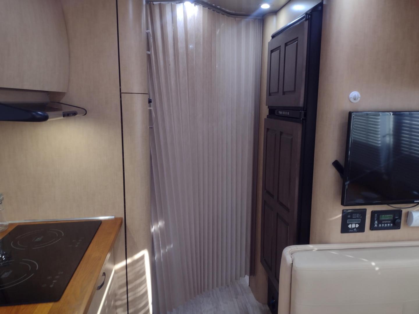 2014 Silver /TAN Airstream FLYING CLOUD 30 30 (1STJ9YP22EJ) , located at 17760 Hwy 62, Morris, OK, 74445, 35.609104, -95.877060 - HAVE YOU EVER WANTED TO BECOME PART OF THE AIRSTREAM FAMILY? WELL HERE IS YOUR CHANCE, CHECK OUT THIS 2014 AIRSTREAM FLYING CLOUD 30 31FT OVERALL WITH A 21FT MANUAL AWNING. ***REBUILT TITLE DUE TO HAIL DAMAGE*** IN THE LIVING AND KITCHEN AREA IS A LEATHER SOFA THAT FOLDS DOWN FOR ADDITIONAL SLEEPING - Photo#36