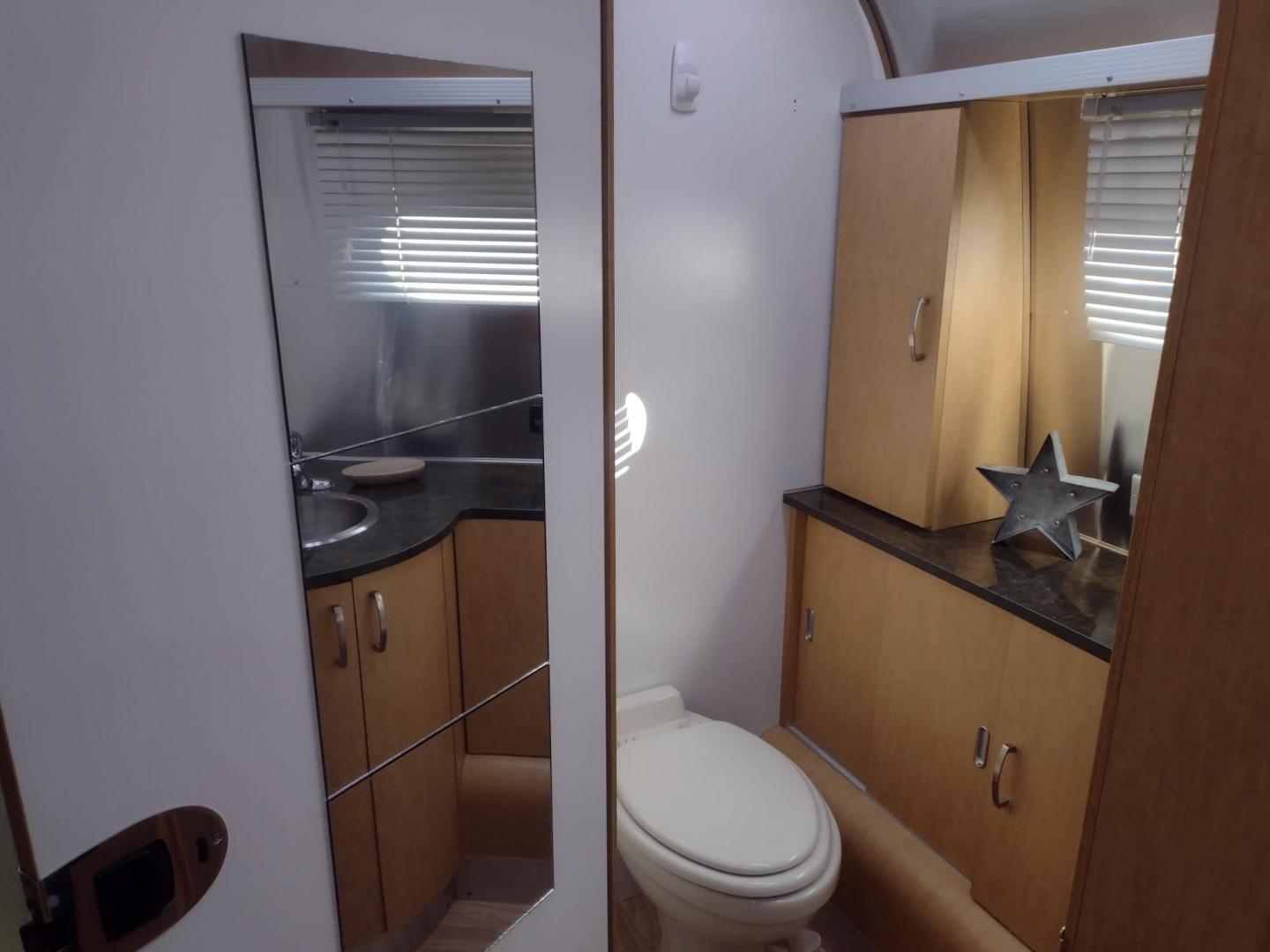 2014 Silver /TAN Airstream FLYING CLOUD 30 30 (1STJ9YP22EJ) , located at 17760 Hwy 62, Morris, OK, 74445, 35.609104, -95.877060 - HAVE YOU EVER WANTED TO BECOME PART OF THE AIRSTREAM FAMILY? WELL HERE IS YOUR CHANCE, CHECK OUT THIS 2014 AIRSTREAM FLYING CLOUD 30 31FT OVERALL WITH A 21FT MANUAL AWNING. ***REBUILT TITLE DUE TO HAIL DAMAGE*** IN THE LIVING AND KITCHEN AREA IS A LEATHER SOFA THAT FOLDS DOWN FOR ADDITIONAL SLEEPING - Photo#39