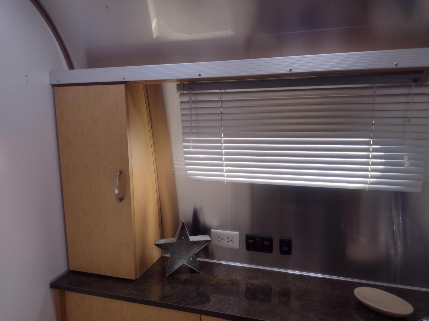 2014 Silver /TAN Airstream FLYING CLOUD 30 30 (1STJ9YP22EJ) , located at 17760 Hwy 62, Morris, OK, 74445, 35.609104, -95.877060 - HAVE YOU EVER WANTED TO BECOME PART OF THE AIRSTREAM FAMILY? WELL HERE IS YOUR CHANCE, CHECK OUT THIS 2014 AIRSTREAM FLYING CLOUD 30 31FT OVERALL WITH A 21FT MANUAL AWNING. ***REBUILT TITLE DUE TO HAIL DAMAGE*** IN THE LIVING AND KITCHEN AREA IS A LEATHER SOFA THAT FOLDS DOWN FOR ADDITIONAL SLEEPING - Photo#42