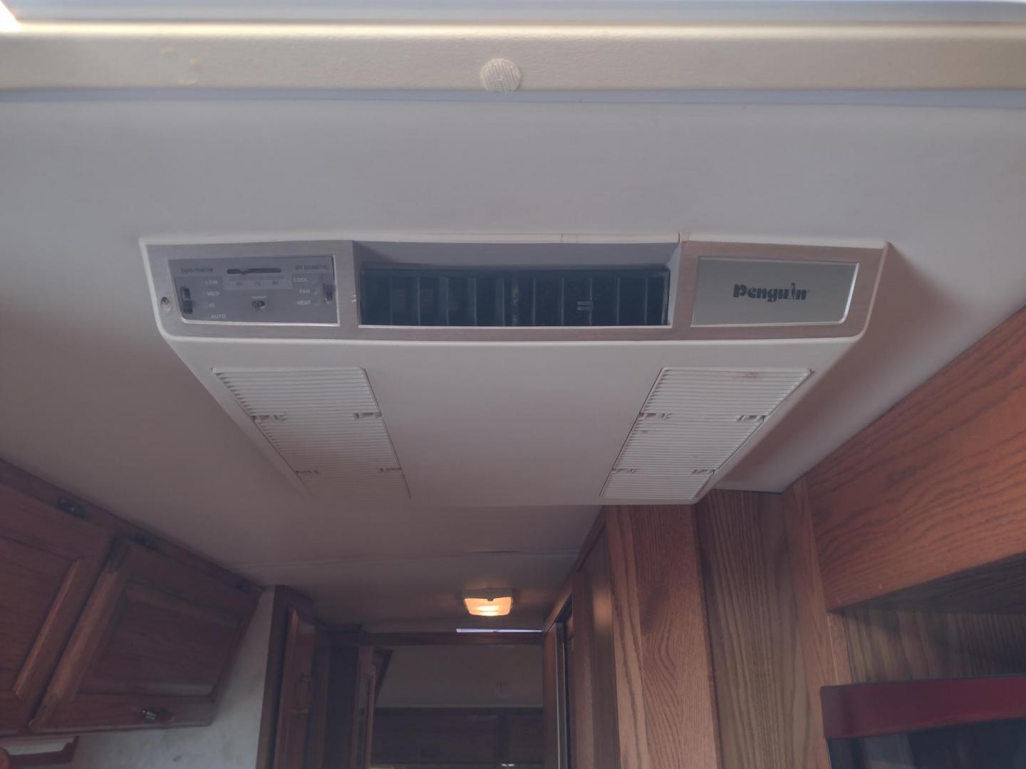 1995 Silver Airstream CLASSIC EXCELLA 25A EXCELLA 25A (1STGEAJ27SJ) , located at 17760 Hwy 62, Morris, OK, 74445, 35.609104, -95.877060 - HAVE YOU EVER WANTED TO BECOME PART OF THE AIRSTREAM FAMILY? WELL HERE IS YOUR CHANCE, CHECK OUT THIS 1995 AIRSTREAM CLASSIC EXCELLA 25A 25.5FT OVERALL WITH 16FT MANUAL AWNING. IN THE LIVING AND KITCHEN AREA IS A SOFA THAT FOLDS DOWN FOR ADDITIONAL SLEEPING, STORAGE UNDER THE SOFA, OVERHEAD CABINETS - Photo#44