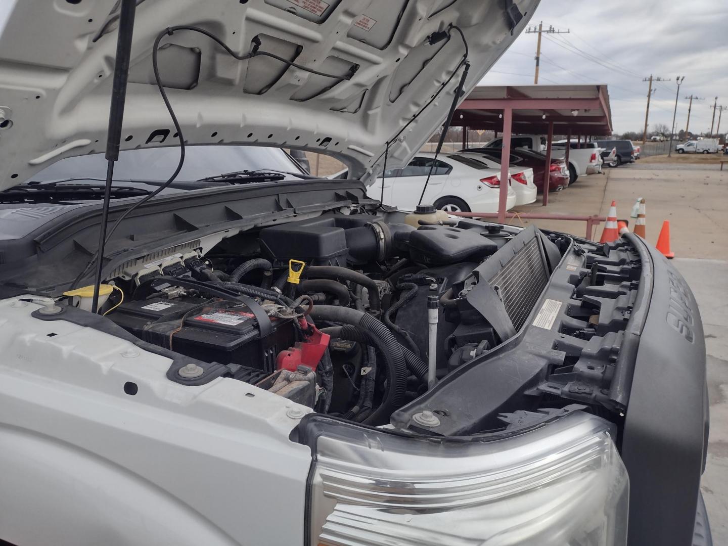 2013 White /Gray Ford F-250 SD 2WD (1FTBF2A60DE) with an 6.2L V8 OHV 16V engine, 6-Speed Automatic transmission, located at 17760 Hwy 62, Morris, OK, 74445, (918) 733-4887, 35.609104, -95.877060 - 2013 F250 2WD SUPER DUTY HAS THE 6.2L V8 ENGINE. THIS IS A DEDICATED CNG ONLY RUNS ON COMPRESSED NATURAL GAS. ***CLEAN TITLE*** THIS FEATURES LEATHER SEATS, MANUAL SEATS, MANUAL WINDOWS, MANUAL LOCKS, MANUAL MIRRORS, BACKUP CAMERA, AM FM RADIO, METAL CONSOLE, CRUISE CONTROL, TRACTION CONTROL, TRAILE - Photo#14