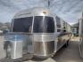 1994 Silver Airstream EXCELLA 1000 EXCELLA 1000 (1STJEAP26RJ) , located at 17760 Hwy 62, Morris, OK, 74445, 35.609104, -95.877060 - HAVE YOU EVER WANTED TO BECOME PART OF THE AIRSTREAM FAMILY? WELL HERE IS YOUR CHANCE, CHECK OUT THIS 1994 AIRSTREAM CLASSIC EXCELLA 1000 30FT OVERALL WITH A 21FT MANUAL AWNING.****CLEAN TITLE**** IN THE LIVING AND KITCHEN AREA IS A COUCH THAT FOLD DOWN FOR ADDITIONAL SLEEPING, HAS PULL OUT STORAGE - Photo#5