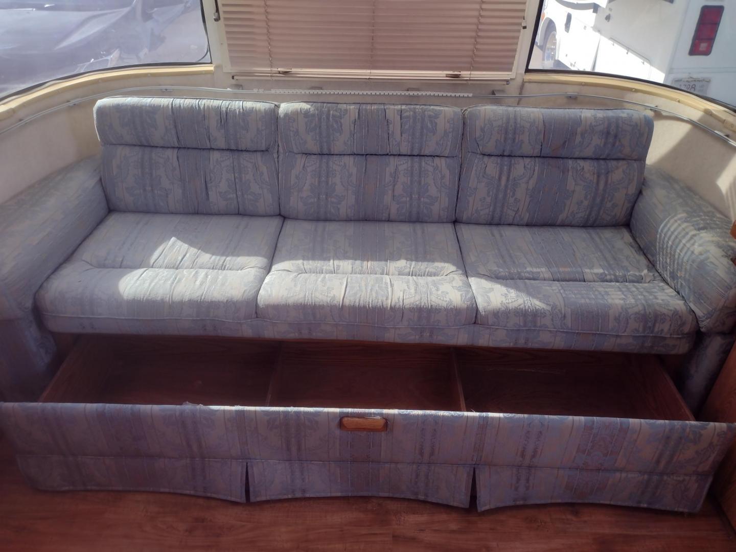 1994 Silver Airstream EXCELLA 1000 EXCELLA 1000 (1STJEAP26RJ) , located at 17760 Hwy 62, Morris, OK, 74445, 35.609104, -95.877060 - HAVE YOU EVER WANTED TO BECOME PART OF THE AIRSTREAM FAMILY? WELL HERE IS YOUR CHANCE, CHECK OUT THIS 1994 AIRSTREAM CLASSIC EXCELLA 1000 30FT OVERALL WITH A 21FT MANUAL AWNING.****CLEAN TITLE**** IN THE LIVING AND KITCHEN AREA IS A COUCH THAT FOLD DOWN FOR ADDITIONAL SLEEPING, HAS PULL OUT STORAGE - Photo#13