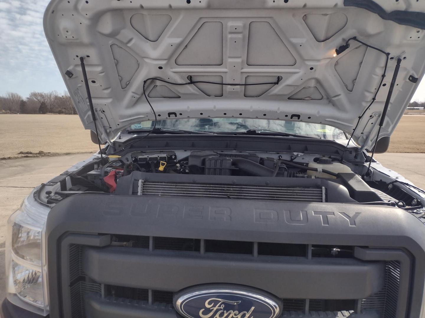 2014 White /Gray Ford F-250 SD (1FT7X2A65EE) with an 6.2L V8 OHV 16V engine, 6-Speed Automatic transmission, located at 17760 Hwy 62, Morris, OK, 74445, (918) 733-4887, 35.609104, -95.877060 - 2014 FORD F250 2WD SUPER DUTY ***CLEAN TITLE*** IS A BI-FUEL SYSTEM THAT RUNS ON CNG (COMPRESSED NATURAL GAS) OR GASOLINE. THIS TRUCK HAS A 6.2L V8 ENGINE, FEATURES LEATHER MANUAL SEAT, MANUAL WINDOWS, MANUAL LOCKS, MANUAL MIRRORS, AM FM RADIO, CRUISE CONTROL, TRACTION CONTROL, TRAILER HITCH, AND S - Photo#25