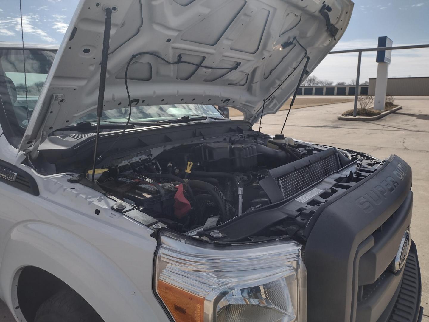 2014 White /Gray Ford F-250 SD (1FT7X2A65EE) with an 6.2L V8 OHV 16V engine, 6-Speed Automatic transmission, located at 17760 Hwy 62, Morris, OK, 74445, (918) 733-4887, 35.609104, -95.877060 - 2014 FORD F250 2WD SUPER DUTY ***CLEAN TITLE*** IS A BI-FUEL SYSTEM THAT RUNS ON CNG (COMPRESSED NATURAL GAS) OR GASOLINE. THIS TRUCK HAS A 6.2L V8 ENGINE, FEATURES LEATHER MANUAL SEAT, MANUAL WINDOWS, MANUAL LOCKS, MANUAL MIRRORS, AM FM RADIO, CRUISE CONTROL, TRACTION CONTROL, TRAILER HITCH, AND S - Photo#26