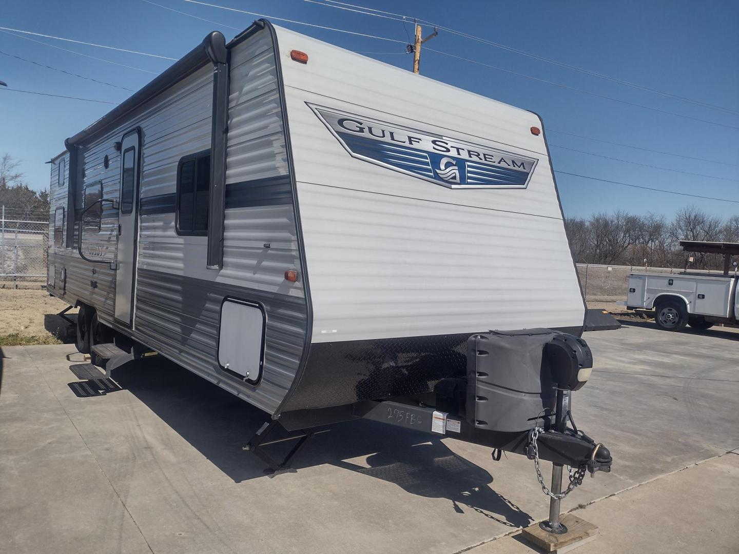 2021 Silver /Gray Gulf Stream Coach, Inc CONQUEST 275FBG 275FBG (1NL1G3020M1) , located at 17760 Hwy 62, Morris, OK, 74445, 35.609104, -95.877060 - CAMPING SEASON IS JUST AROUND THE CORNER COME CHECK OUT THIS 2021 GULF STREAM CONQUEST 275FBG 30FT OVERALL!!! ***APPEARS TO BE IN UNUSED CONDITION*** ***CLEAN TITLE*** IN THE FRONT IS A QUEEN SIZE BED WITH STORAGE UNDER BED, OVERHEAD CABINETS, AND 2 WARDROBE CLOSETS. IN THE LIVING AND KITCHEN AREA - Photo#0