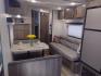2021 Silver /Gray Gulf Stream Coach, Inc CONQUEST 275FBG 275FBG (1NL1G3020M1) , located at 17760 Hwy 62, Morris, OK, 74445, 35.609104, -95.877060 - CAMPING SEASON IS JUST AROUND THE CORNER COME CHECK OUT THIS 2021 GULF STREAM CONQUEST 275FBG 30FT OVERALL!!! ***APPEARS TO BE IN UNUSED CONDITION*** ***CLEAN TITLE*** IN THE FRONT IS A QUEEN SIZE BED WITH STORAGE UNDER BED, OVERHEAD CABINETS, AND 2 WARDROBE CLOSETS. IN THE LIVING AND KITCHEN AREA - Photo#7