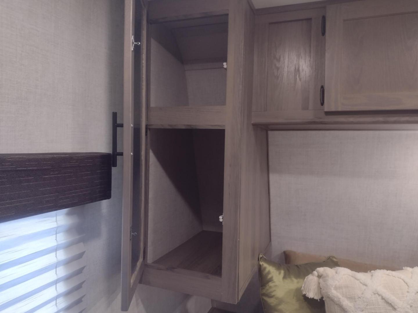 2021 Silver /Gray Gulf Stream Coach, Inc CONQUEST 275FBG 275FBG (1NL1G3020M1) , located at 17760 Hwy 62, Morris, OK, 74445, 35.609104, -95.877060 - CAMPING SEASON IS JUST AROUND THE CORNER COME CHECK OUT THIS 2021 GULF STREAM CONQUEST 275FBG 30FT OVERALL!!! ***APPEARS TO BE IN UNUSED CONDITION*** ***CLEAN TITLE*** IN THE FRONT IS A QUEEN SIZE BED WITH STORAGE UNDER BED, OVERHEAD CABINETS, AND 2 WARDROBE CLOSETS. IN THE LIVING AND KITCHEN AREA - Photo#12