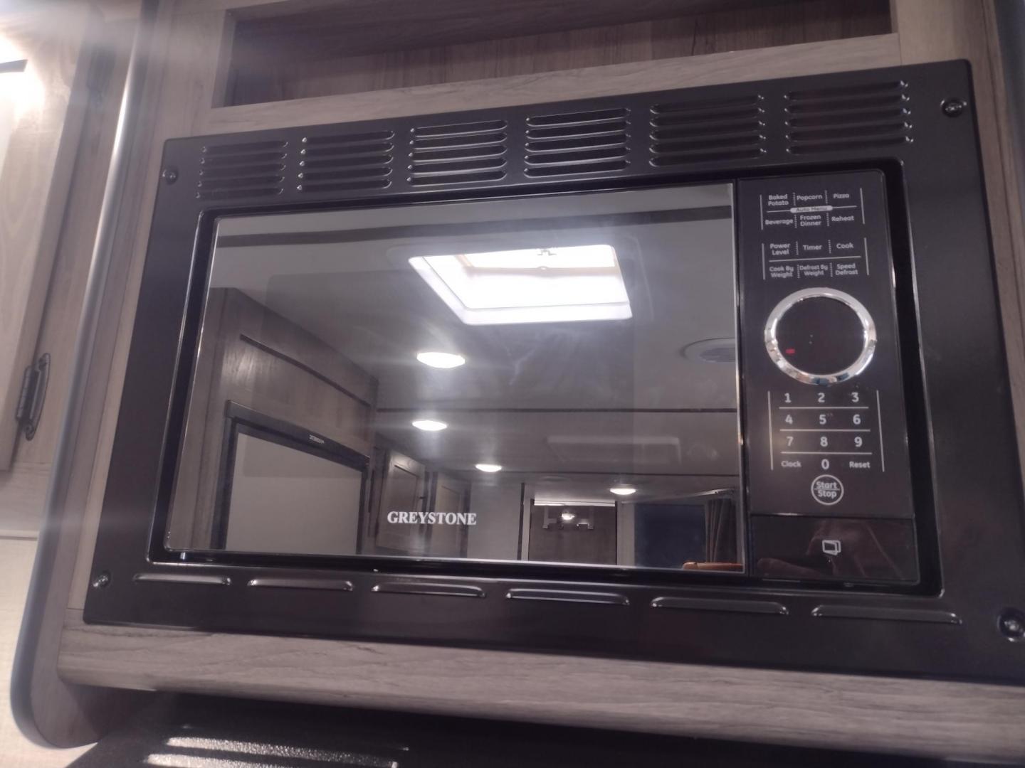 2021 Silver /Gray Gulf Stream Coach, Inc CONQUEST 275FBG 275FBG (1NL1G3020M1) , located at 17760 Hwy 62, Morris, OK, 74445, 35.609104, -95.877060 - CAMPING SEASON IS JUST AROUND THE CORNER COME CHECK OUT THIS 2021 GULF STREAM CONQUEST 275FBG 30FT OVERALL!!! ***APPEARS TO BE IN UNUSED CONDITION*** ***CLEAN TITLE*** IN THE FRONT IS A QUEEN SIZE BED WITH STORAGE UNDER BED, OVERHEAD CABINETS, AND 2 WARDROBE CLOSETS. IN THE LIVING AND KITCHEN AREA - Photo#17