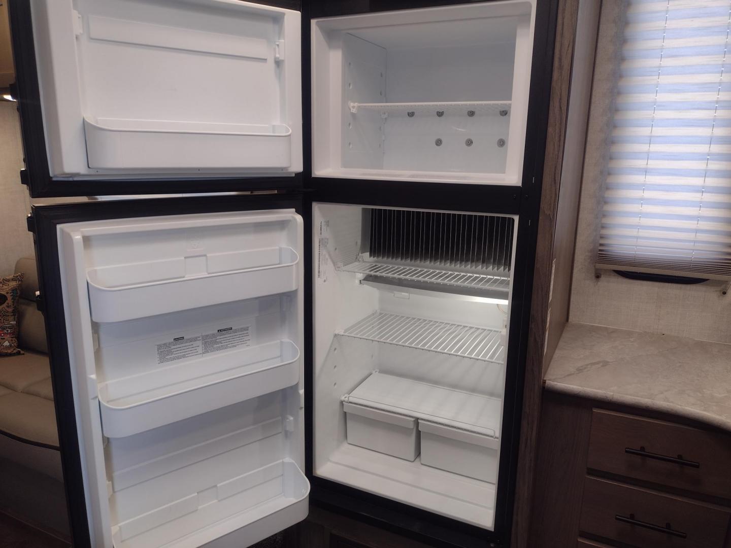 2021 Silver /Gray Gulf Stream Coach, Inc CONQUEST 275FBG 275FBG (1NL1G3020M1) , located at 17760 Hwy 62, Morris, OK, 74445, 35.609104, -95.877060 - CAMPING SEASON IS JUST AROUND THE CORNER COME CHECK OUT THIS 2021 GULF STREAM CONQUEST 275FBG 30FT OVERALL!!! ***APPEARS TO BE IN UNUSED CONDITION*** ***CLEAN TITLE*** IN THE FRONT IS A QUEEN SIZE BED WITH STORAGE UNDER BED, OVERHEAD CABINETS, AND 2 WARDROBE CLOSETS. IN THE LIVING AND KITCHEN AREA - Photo#22