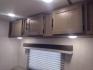 2021 Silver /Gray Gulf Stream Coach, Inc CONQUEST 275FBG 275FBG (1NL1G3020M1) , located at 17760 Hwy 62, Morris, OK, 74445, 35.609104, -95.877060 - CAMPING SEASON IS JUST AROUND THE CORNER COME CHECK OUT THIS 2021 GULF STREAM CONQUEST 275FBG 30FT OVERALL!!! ***APPEARS TO BE IN UNUSED CONDITION*** ***CLEAN TITLE*** IN THE FRONT IS A QUEEN SIZE BED WITH STORAGE UNDER BED, OVERHEAD CABINETS, AND 2 WARDROBE CLOSETS. IN THE LIVING AND KITCHEN AREA - Photo#25
