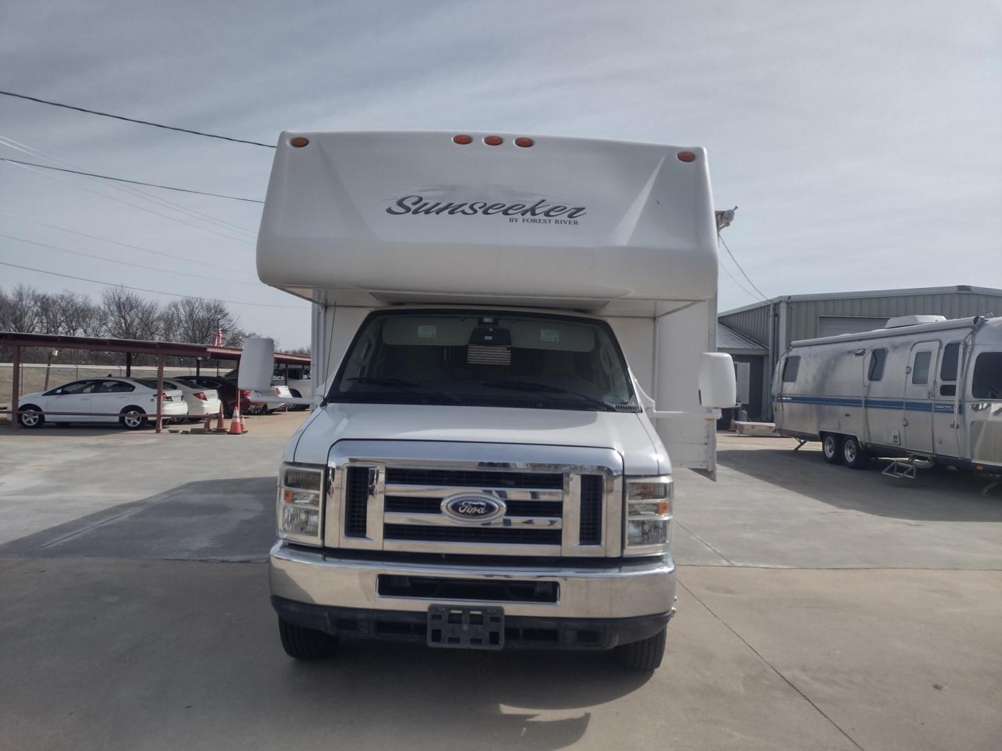 2012 White /BROWN Ford Econoline E450 (1FDXE4FS5BD) with an 6.8L V10 SOHC 20V engine, located at 17760 Hwy 62, Morris, OK, 74445, 35.609104, -95.877060 - SPRING TIME IS HERE WHAT BETTER WAY TO START YOUR TRAVELS IN THIS 2012 FORD E450 2WD FOREST RIVER SUNSEEKER 2860DS CLASS C MOTORHOME 30FT OVERALL. IT FEATURES THE TRITON 6.8L V10 ENGINE, KEYLESS ENTRY, CLOTH MANUAL SEATS, POWER WINDOWS, POWER LOCKS, POWER MIRRORS, CRUISE CONTROL, TOW HAUL MODE, BACK - Photo#1