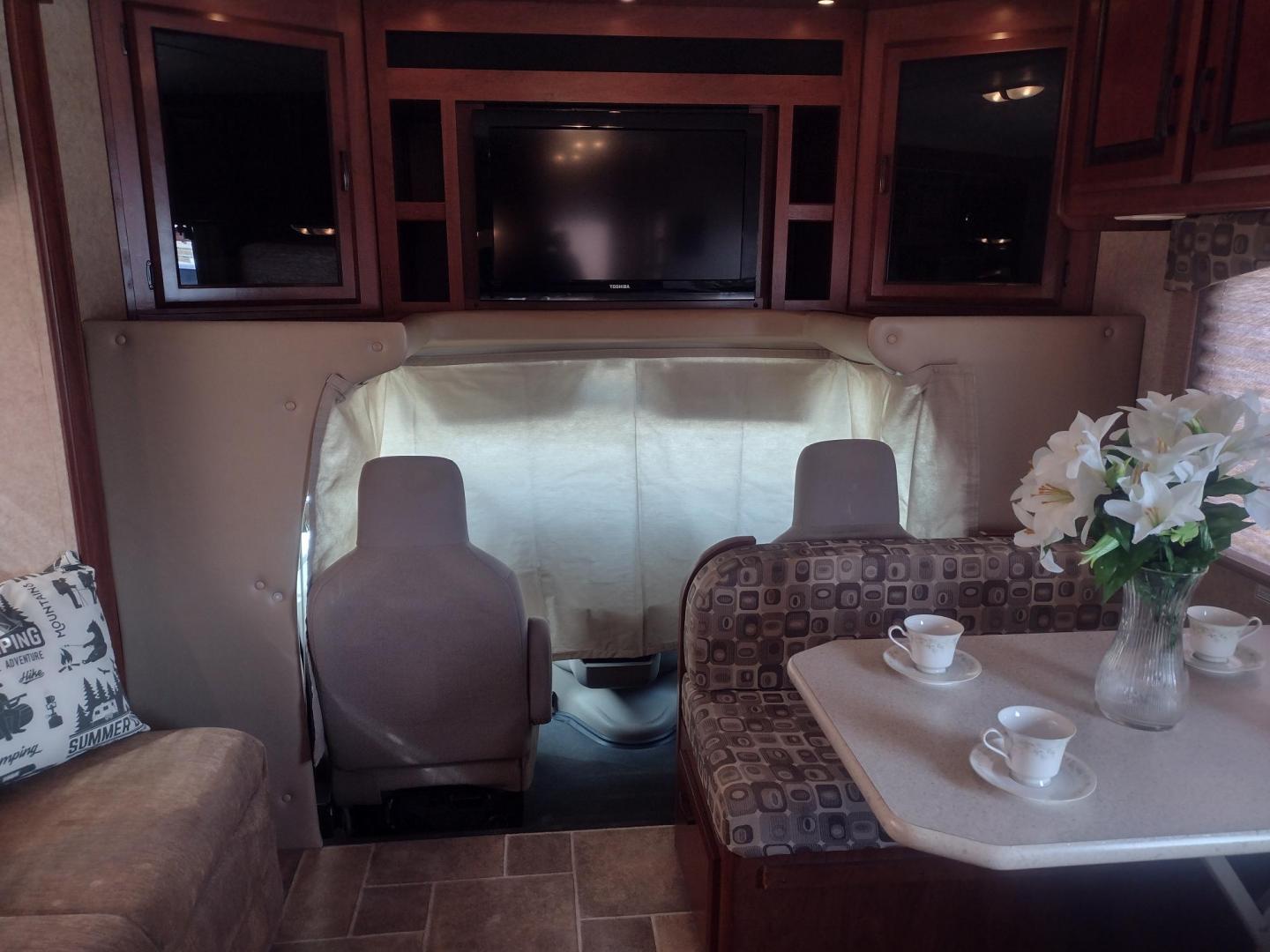 2012 White /BROWN Ford Econoline E450 (1FDXE4FS5BD) with an 6.8L V10 SOHC 20V engine, located at 17760 Hwy 62, Morris, OK, 74445, 35.609104, -95.877060 - SPRING TIME IS HERE WHAT BETTER WAY TO START YOUR TRAVELS IN THIS 2012 FORD E450 2WD FOREST RIVER SUNSEEKER 2860DS CLASS C MOTORHOME 30FT OVERALL. IT FEATURES THE TRITON 6.8L V10 ENGINE, KEYLESS ENTRY, CLOTH MANUAL SEATS, POWER WINDOWS, POWER LOCKS, POWER MIRRORS, CRUISE CONTROL, TOW HAUL MODE, BACK - Photo#21